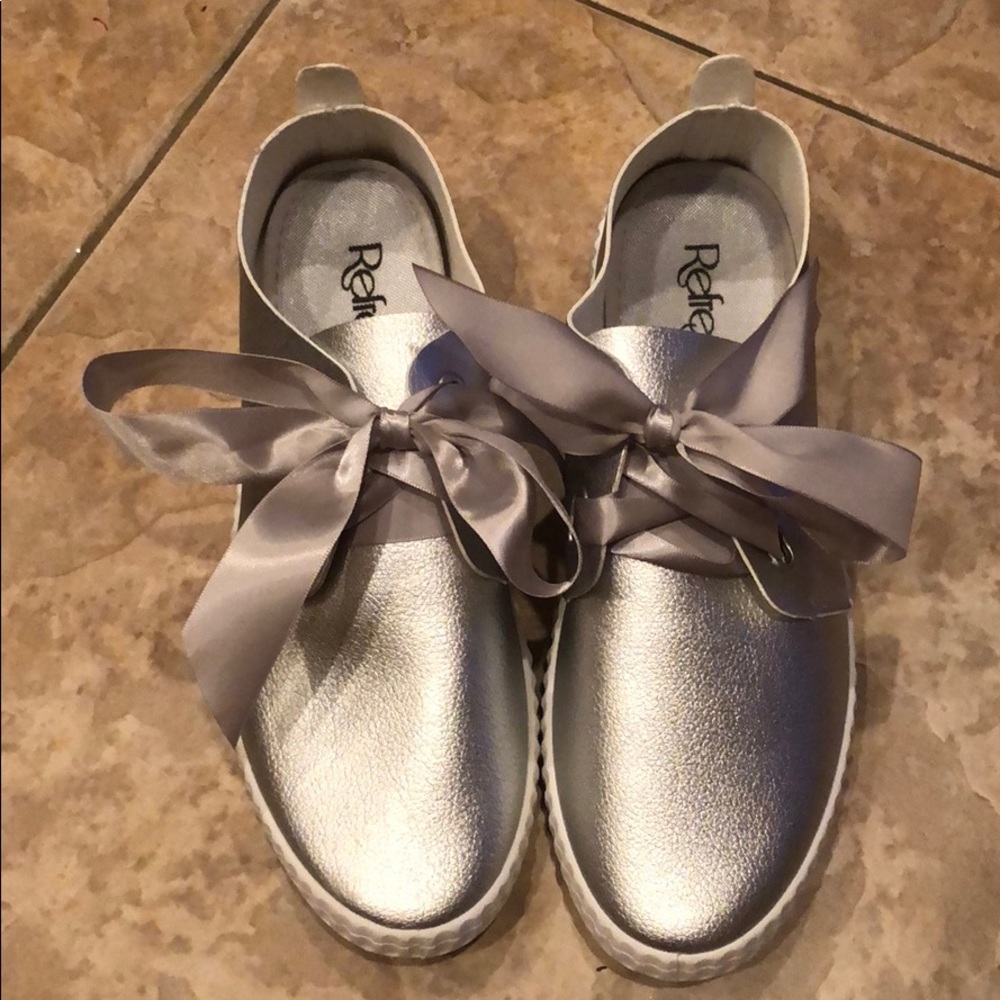 Silver tennis shoes